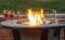 Fire table with round glass guard