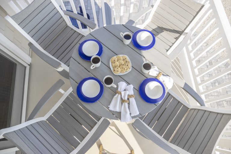 Overhead view of light gray table and chairs
